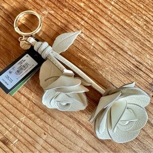 Kate Spade Crinkle Patent Leather Double Rose bag charm